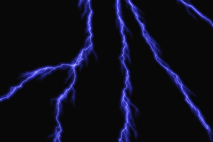 Several bright blue-white lightning bolts branching down a solid black night sky.
