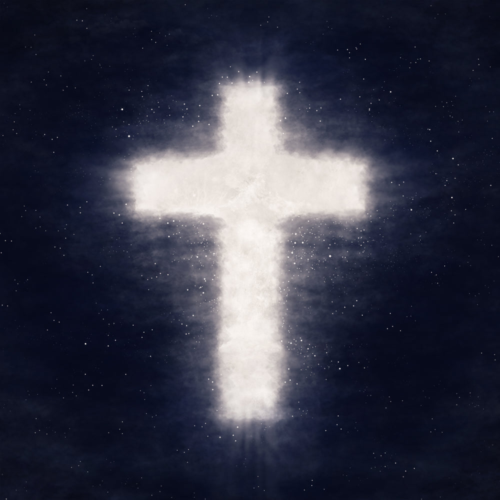 A glowing white cross formed from cloud and light against a dark, star-filled night sky.